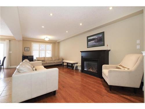 33 Huck Crescent, Kitchener, ON - Indoor Photo Showing Living Room With Fireplace