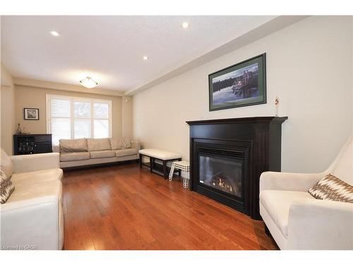 33 Huck Crescent, Kitchener, ON - Indoor Photo Showing Living Room With Fireplace