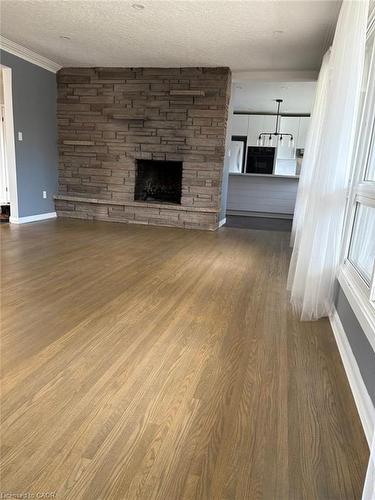 312 Grantham Avenue, St. Catharines, ON - Indoor Photo Showing Living Room With Fireplace