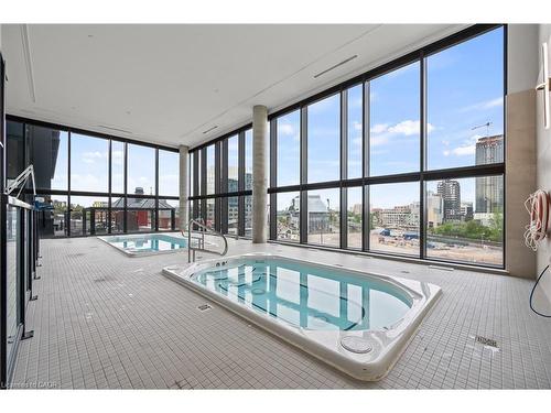 907-25 Wellington Street S, Kitchener, ON - Indoor Photo Showing Other Room With In Ground Pool