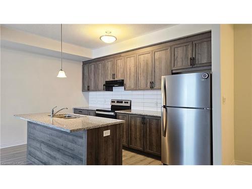 A036-142 Foamflower Place, Waterloo, ON - Indoor Photo Showing Kitchen With Double Sink