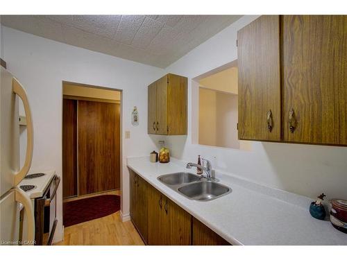 312-80 Breckenridge Drive, Kitchener, ON - Indoor Photo Showing Kitchen With Double Sink