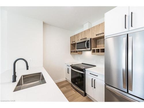 304-24 Union Street E, Waterloo, ON - Indoor Photo Showing Kitchen With Double Sink
