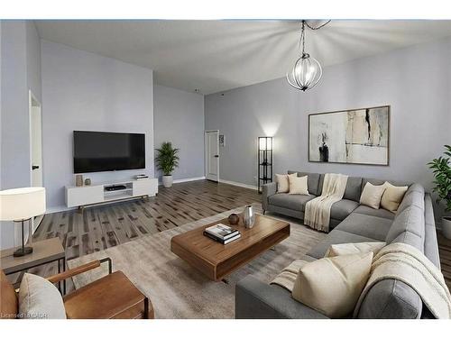 407-4013 Kilmer Drive, Burlington, ON - Indoor Photo Showing Living Room