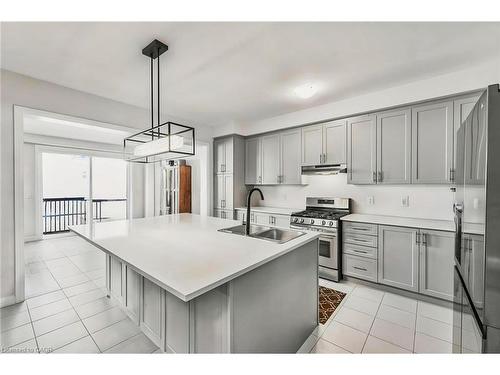 1403 Upper Thames Drive, Woodstock, ON - Indoor Photo Showing Kitchen With Double Sink