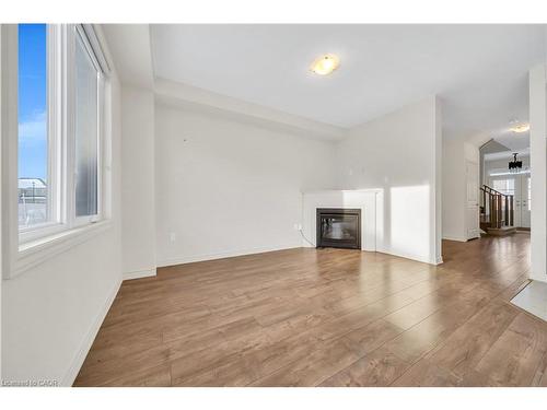 76 Prest Way, Centre Wellington, ON - Indoor Photo Showing Living Room With Fireplace