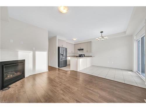 76 Prest Way, Centre Wellington, ON - Indoor With Fireplace