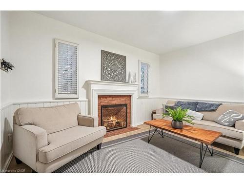 144 Carmichael Crescent, The Blue Mountains, ON - Indoor Photo Showing Living Room With Fireplace