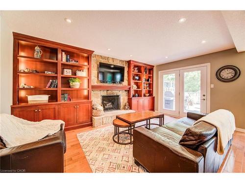 33 Tinatawa Court, Kitchener, ON - Indoor Photo Showing Living Room With Fireplace