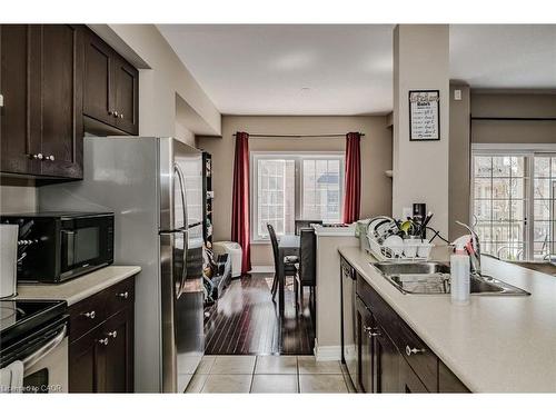 83-1401 Plains Road E, Burlington, ON - Indoor Photo Showing Kitchen With Double Sink