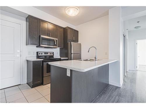 706-2486 Old Bronte Road, Oakville, ON - Indoor Photo Showing Kitchen With Double Sink With Upgraded Kitchen