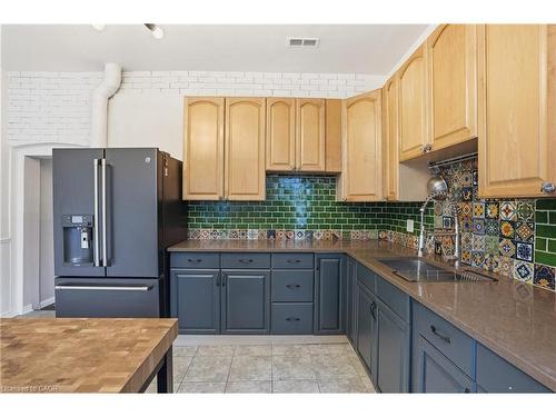 313 Mary Street, Hamilton, ON - Indoor Photo Showing Kitchen With Double Sink