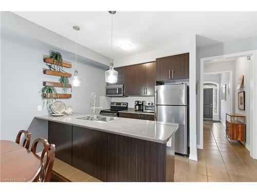 11-5056 New Street, Burlington, ON - Indoor Photo Showing Kitchen With Double Sink