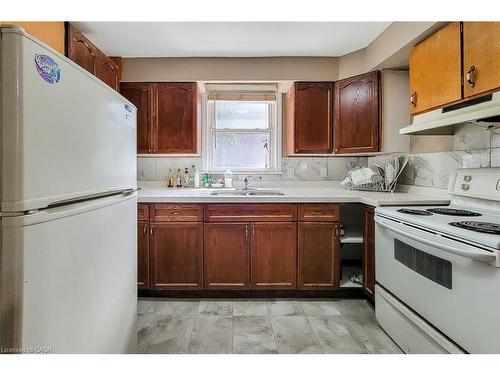 33 Norfolk Street S, Hamilton, ON - Indoor Photo Showing Kitchen With Double Sink