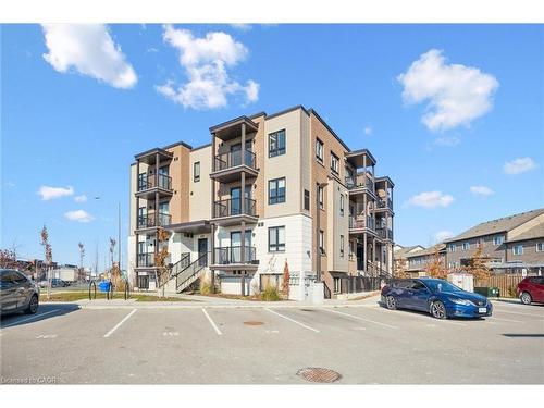 B16-1331 Countrystone Drive, Kitchener, ON - Outdoor With Balcony With Facade