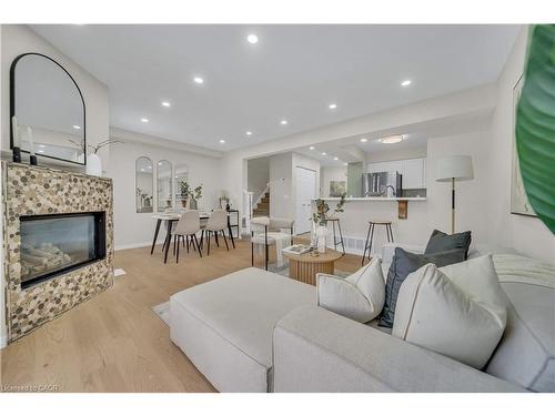 540 Mariner Drive, Waterloo, ON - Indoor Photo Showing Living Room With Fireplace