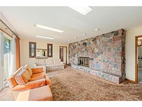 6828 Third Line, Chatham, ON - Indoor Photo Showing Living Room With Fireplace