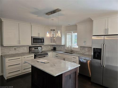 71 Cobblestone Drive, Paris, ON - Indoor Photo Showing Kitchen With Double Sink