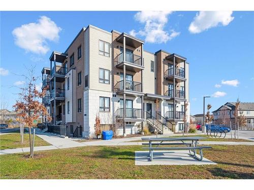 B16-1331 Countrystone Drive, Kitchener, ON - Outdoor With Balcony With Facade