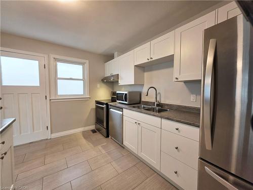 3-69 Edinburgh Road, Kitchener, ON - Indoor Photo Showing Kitchen With Stainless Steel Kitchen With Double Sink
