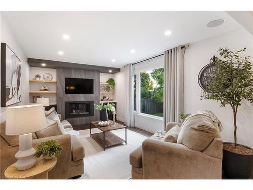 391 Strawberry Crescent, Waterloo, ON - Indoor Photo Showing Living Room With Fireplace