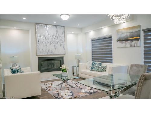 18 Brewis Street, Paris, ON - Indoor Photo Showing Other Room With Fireplace