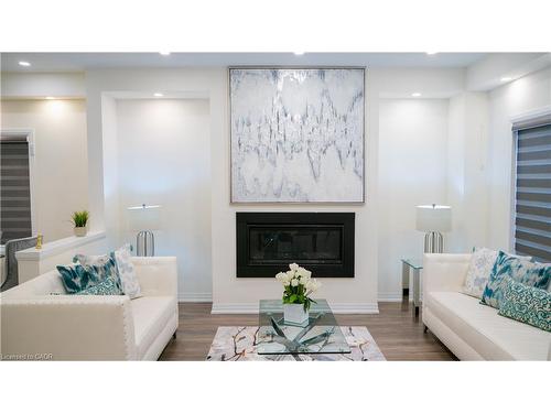 18 Brewis Street, Paris, ON - Indoor Photo Showing Living Room With Fireplace
