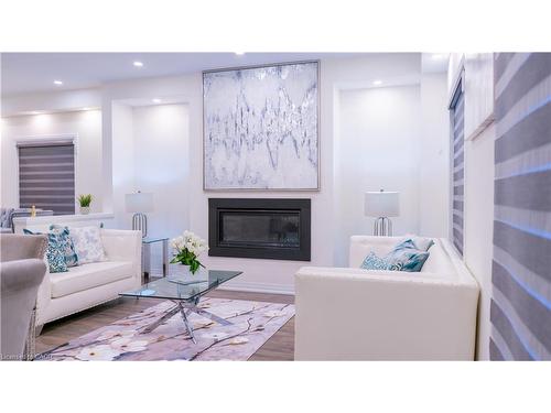 18 Brewis Street, Paris, ON - Indoor Photo Showing Living Room With Fireplace