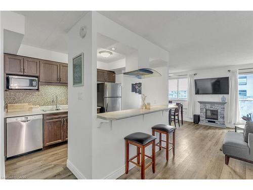226-42 Tannery Street E, Cambridge, ON - Indoor Photo Showing Kitchen With Fireplace