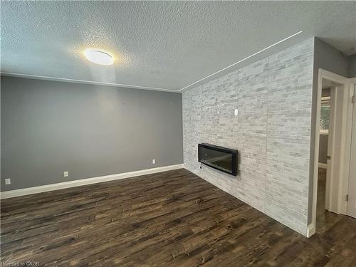 Upper-47 Harber Avenue, Kitchener, ON - Indoor With Fireplace