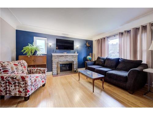 143 Rosedale Avenue, Hamilton, ON - Indoor Photo Showing Living Room With Fireplace