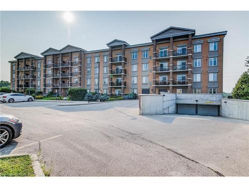 401-2 Colonial Drive, Guelph, ON - Outdoor With Balcony With Facade