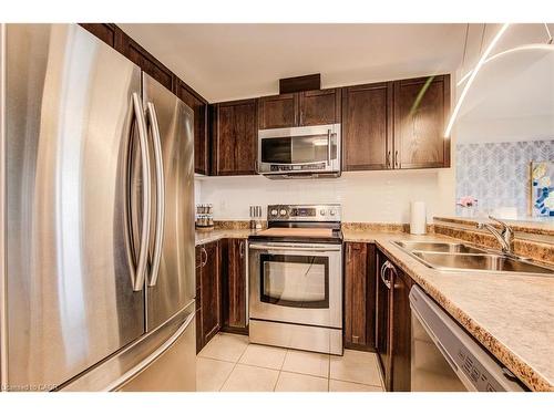 401-2 Colonial Drive, Guelph, ON - Indoor Photo Showing Kitchen With Double Sink