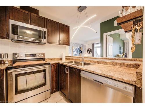 401-2 Colonial Drive, Guelph, ON - Indoor Photo Showing Kitchen With Double Sink
