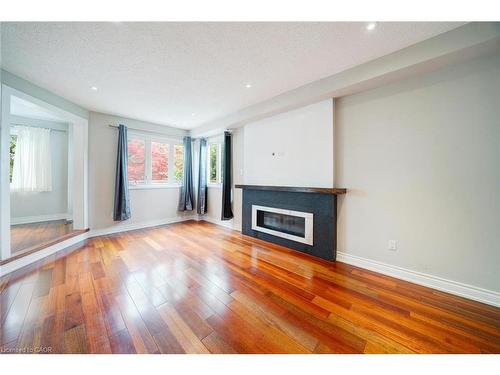 102 Crawford Rose Drive, Aurora, ON - Indoor Photo Showing Living Room With Fireplace