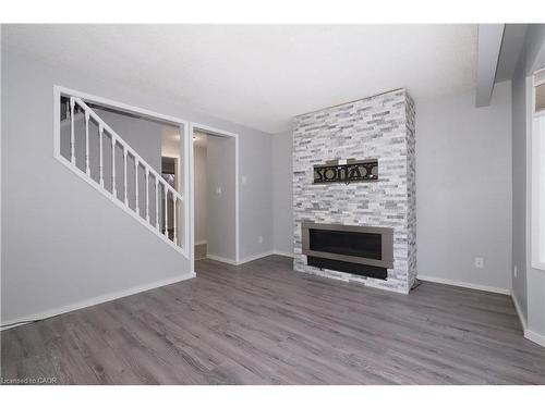 112 Green Valley Drive, Kitchener, ON - Indoor Photo Showing Living Room With Fireplace