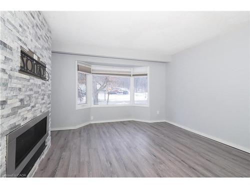 112 Green Valley Drive, Kitchener, ON - Indoor Photo Showing Other Room With Fireplace