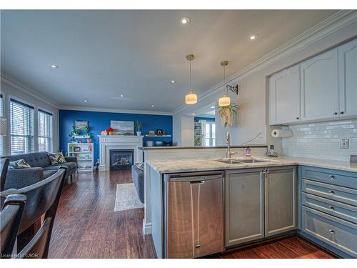 23 Mayo Avenue, Cambridge, ON - Indoor Photo Showing Kitchen With Fireplace With Double Sink