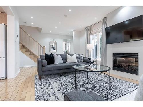 Upper-259 Higginbotham Crescent, Milton, ON - Indoor Photo Showing Living Room With Fireplace