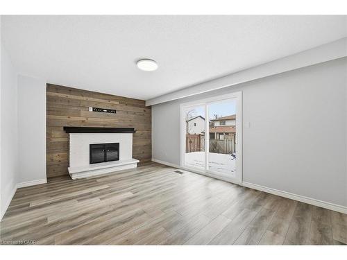 2344 Glastonbury Road, Burlington, ON - Indoor Photo Showing Living Room With Fireplace
