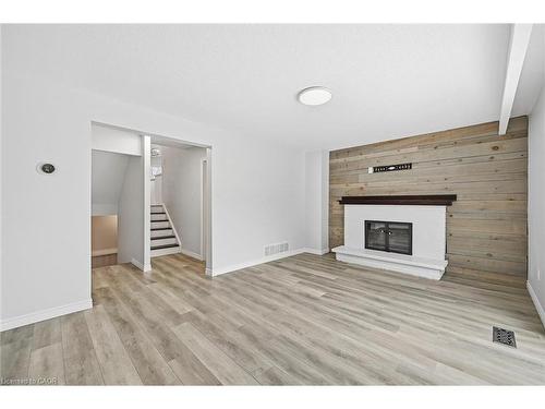 2344 Glastonbury Road, Burlington, ON - Indoor Photo Showing Other Room With Fireplace