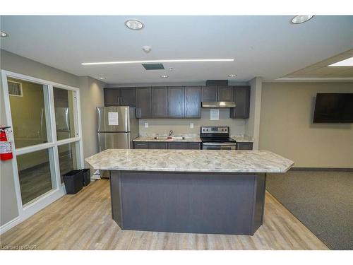 107-7 Kay Crescent, Guelph, ON - Indoor Photo Showing Kitchen With Upgraded Kitchen