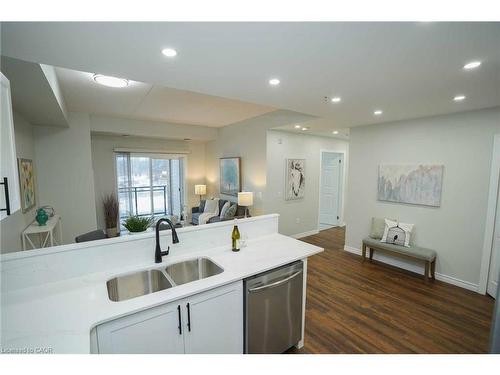 107-7 Kay Crescent, Guelph, ON - Indoor Photo Showing Kitchen With Double Sink