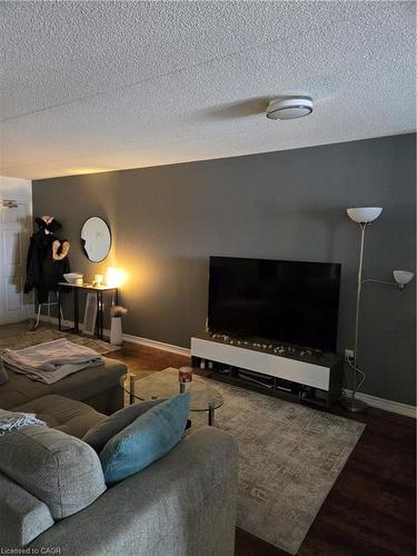 305-1390 Main Street E, Milton, ON - Indoor Photo Showing Living Room