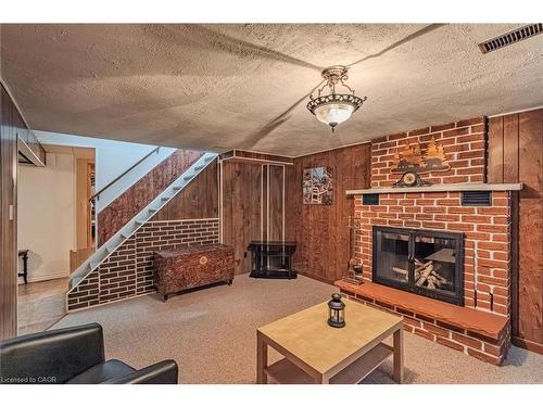 26 Douglas Avenue, Simcoe, ON - Indoor Photo Showing Living Room With Fireplace