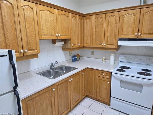135 Logan Avenue, Toronto, ON - Indoor Photo Showing Kitchen With Double Sink
