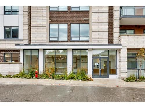 307-123 Maurice Drive, Oakville, ON - Outdoor With Facade