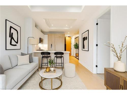 307-123 Maurice Drive, Oakville, ON - Indoor Photo Showing Living Room