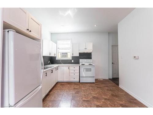 1-265 Main Street W, Hamilton, ON - Indoor Photo Showing Kitchen With Double Sink