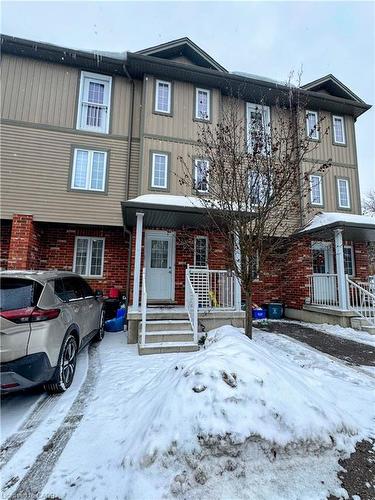 9-55 Mooregate Crescent, Kitchener, ON - Outdoor With Facade